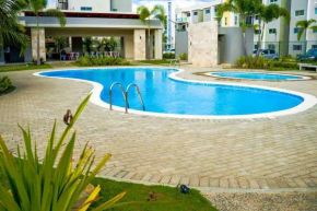 Acogedor Apartamento con piscina Breezes